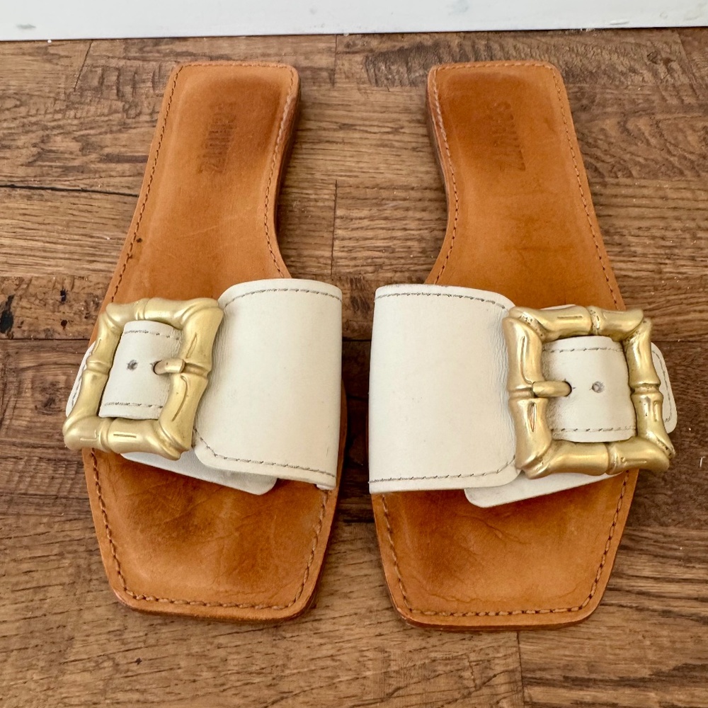 SCHUTZ Cream Leather Slide Sandals with Gold Buckle